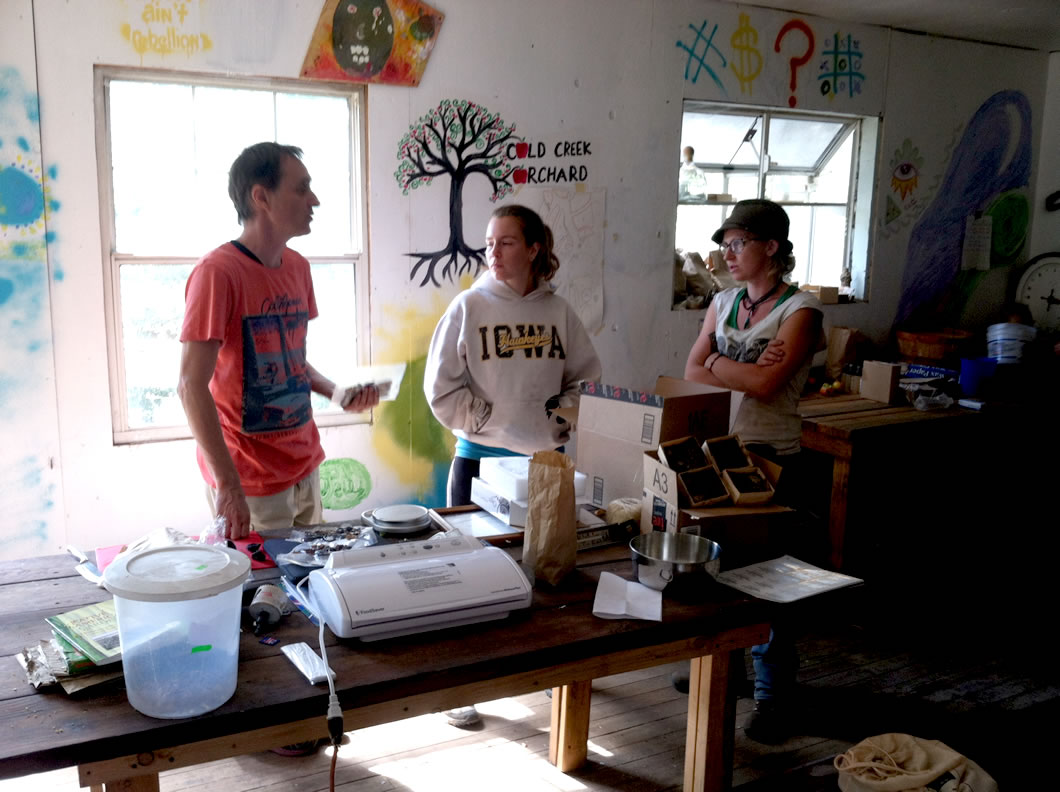 (L to R) Cold Creek Orchard owner Daniel Vesely and WWOOFers Nicole and Corrie
